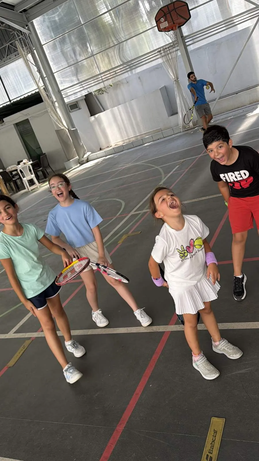 Group of students laughing during a session