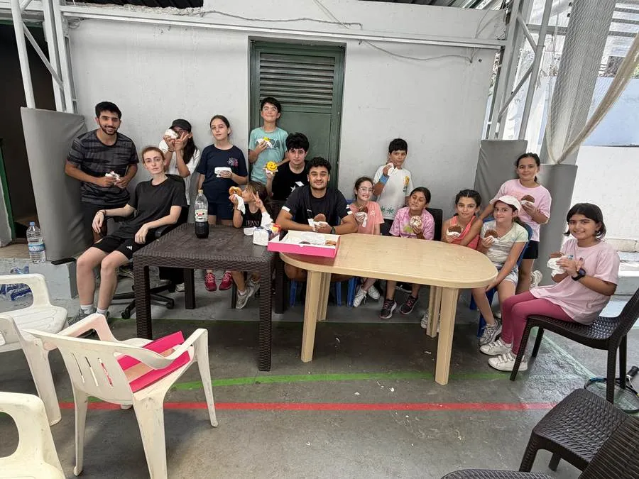 Camp group enjoying a treat break