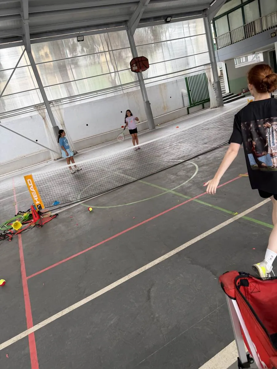 Students practicing at the net